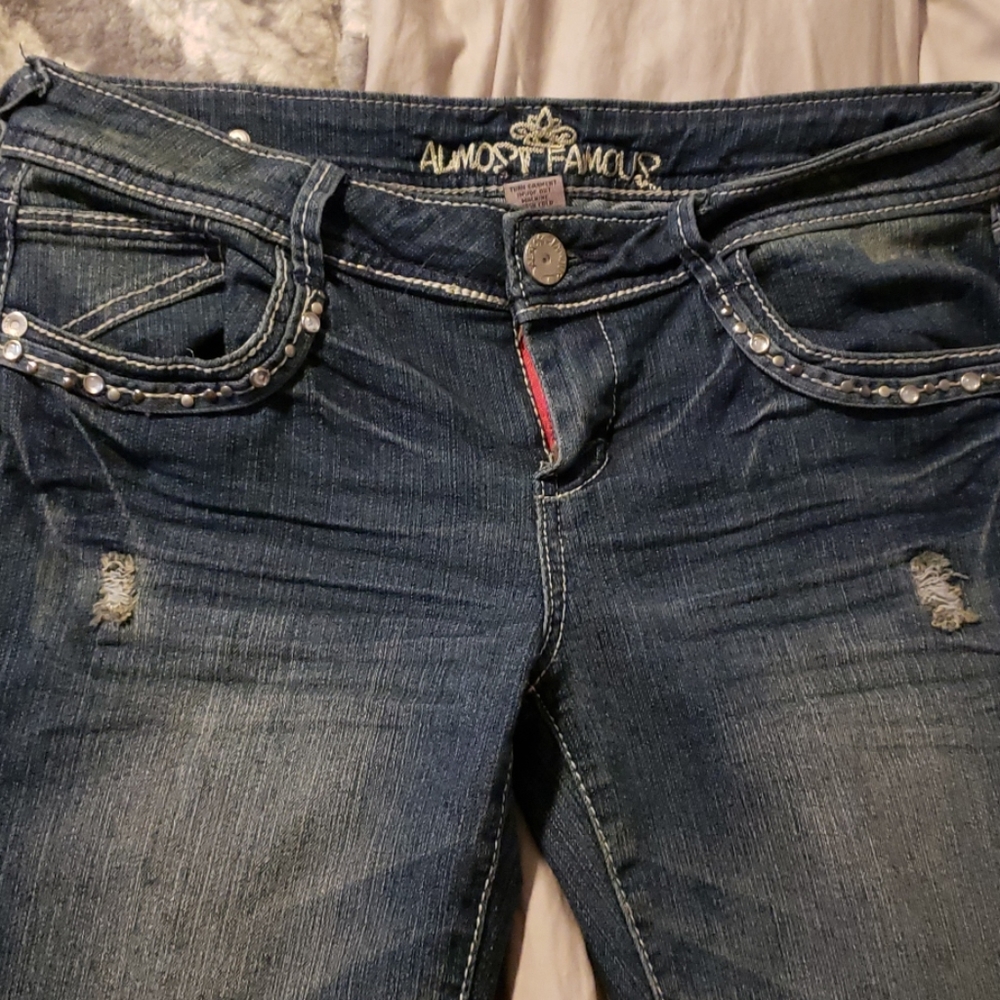 Distressed jeans by Almost Famous